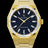 Gold frosted watch with blue aventurine dial and trapezoid-cut moissanite bezel reflecting light in sharp, diamond-like flashes.