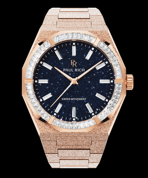 Rose gold frosted watch with blue aventurine dial and trapezoid-cut moissanite bezel reflecting light in sharp, diamond-like flashes.
