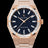 Rose gold frosted watch with blue aventurine dial and trapezoid-cut moissanite bezel reflecting light in sharp, diamond-like flashes.