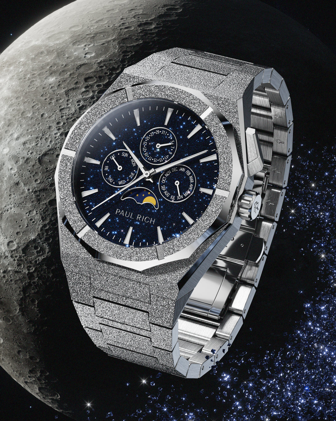 Frosted silver stainless steel watch with blue aventurine dial, moonphase, and subdials, set against a detailed lunar surface and starry space backdrop.