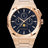Paul Rich rose gold watch with black aventurine dial, moonphase display, and three subdials on a brushed bracelet.