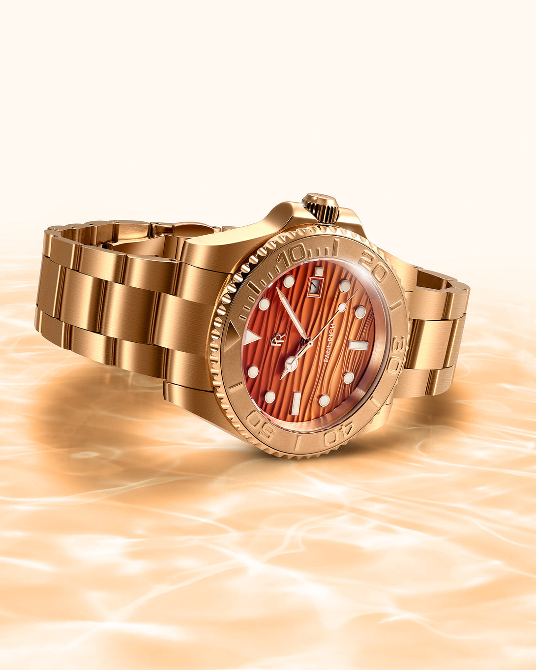 Gold-tone watch with an orange wave-textured dial resting on warm reflective water, showing the case, bezel, and bracelet in detail.